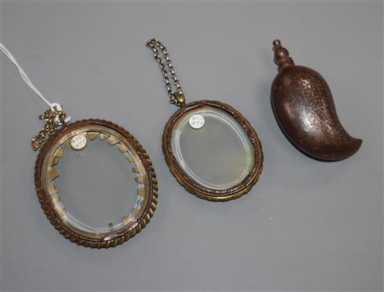 Two early miniature frames and a scent bottle